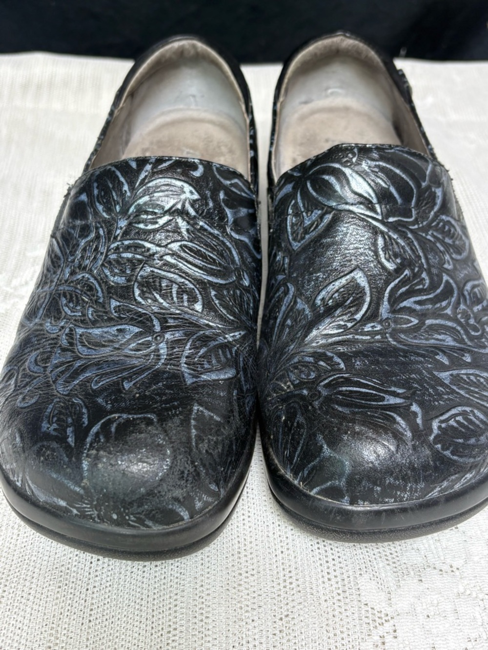Alegria Black Floral-Embossed Slip-On Clogs